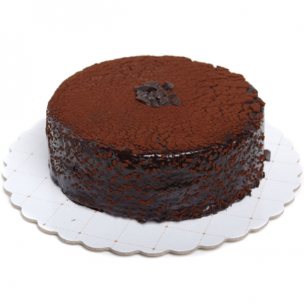 Плътен течен шоколад и какао върху шоколадов кейк от Торти Чочко